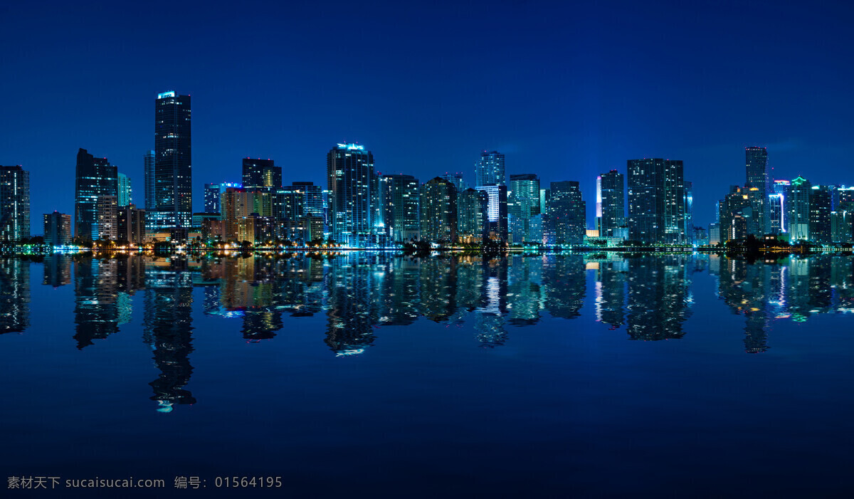 海滨城市夜景 海滨城市 高楼 建筑 天空 夜景 城市风光 环境家居 描述 蓝色