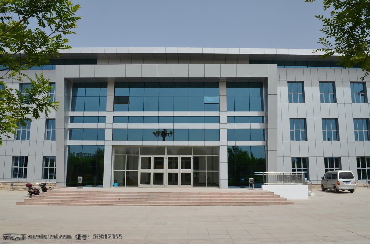 办公楼 不锈钢门 门 办公楼门 工程案列 树叶 蓝天 大楼 办公中心 建筑景观 自然景观