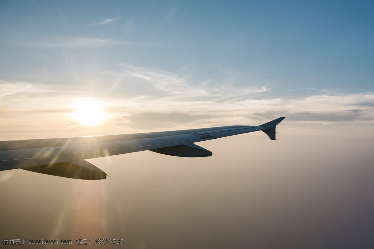 飞机机翼 飞机 机翼 蓝天白云 夕阳 阳光 逆光飞机 逆光机翼 飞机部件 飞机元素 飞机素材 蓝天 天空 交通工具 现代科技
